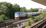 Amtrak 198 pulling a train into Alexandria station